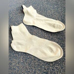 Silver glittery socks with black bow. Never worn.